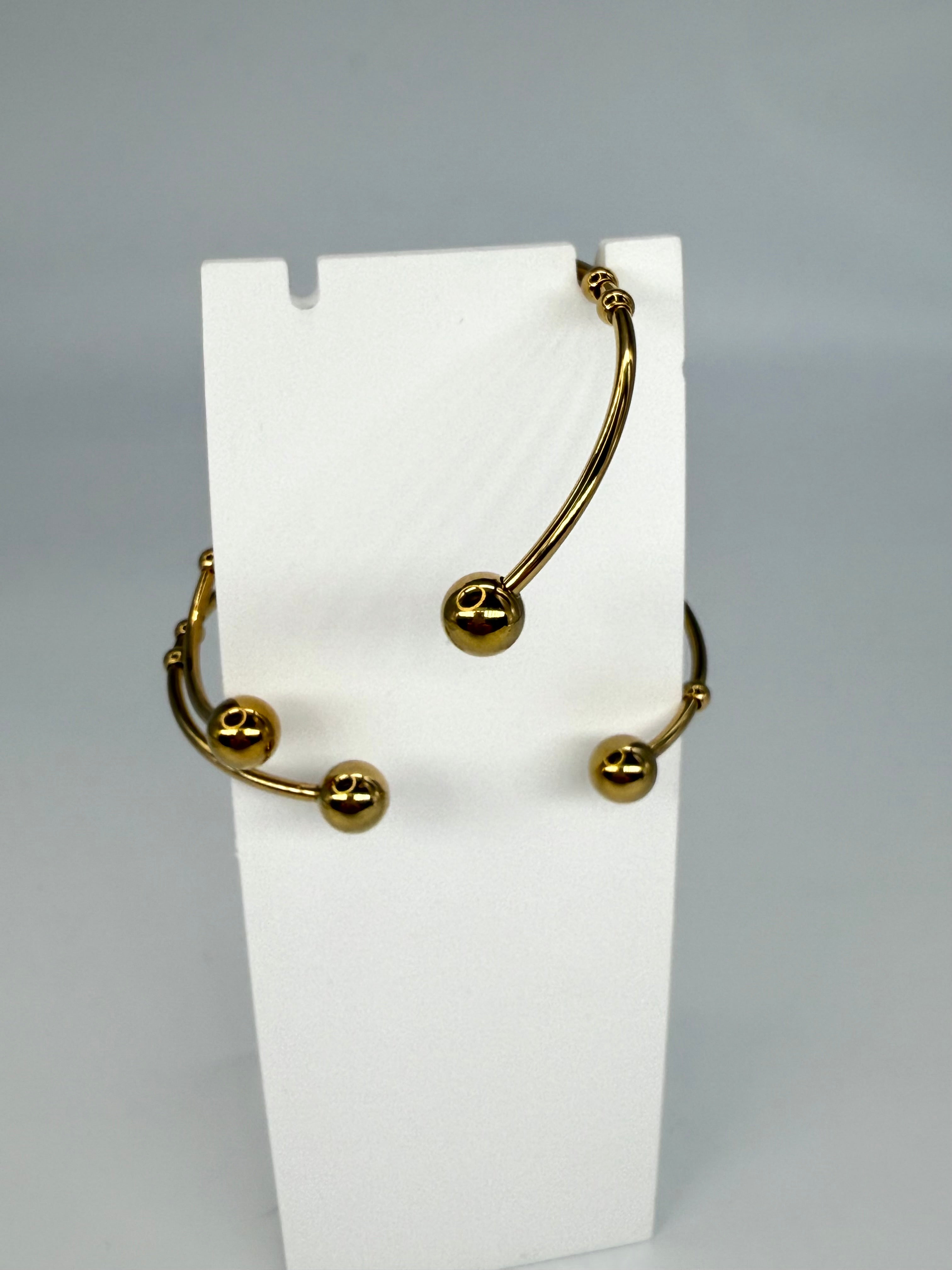 Armreif mit Augensymbol in Gold