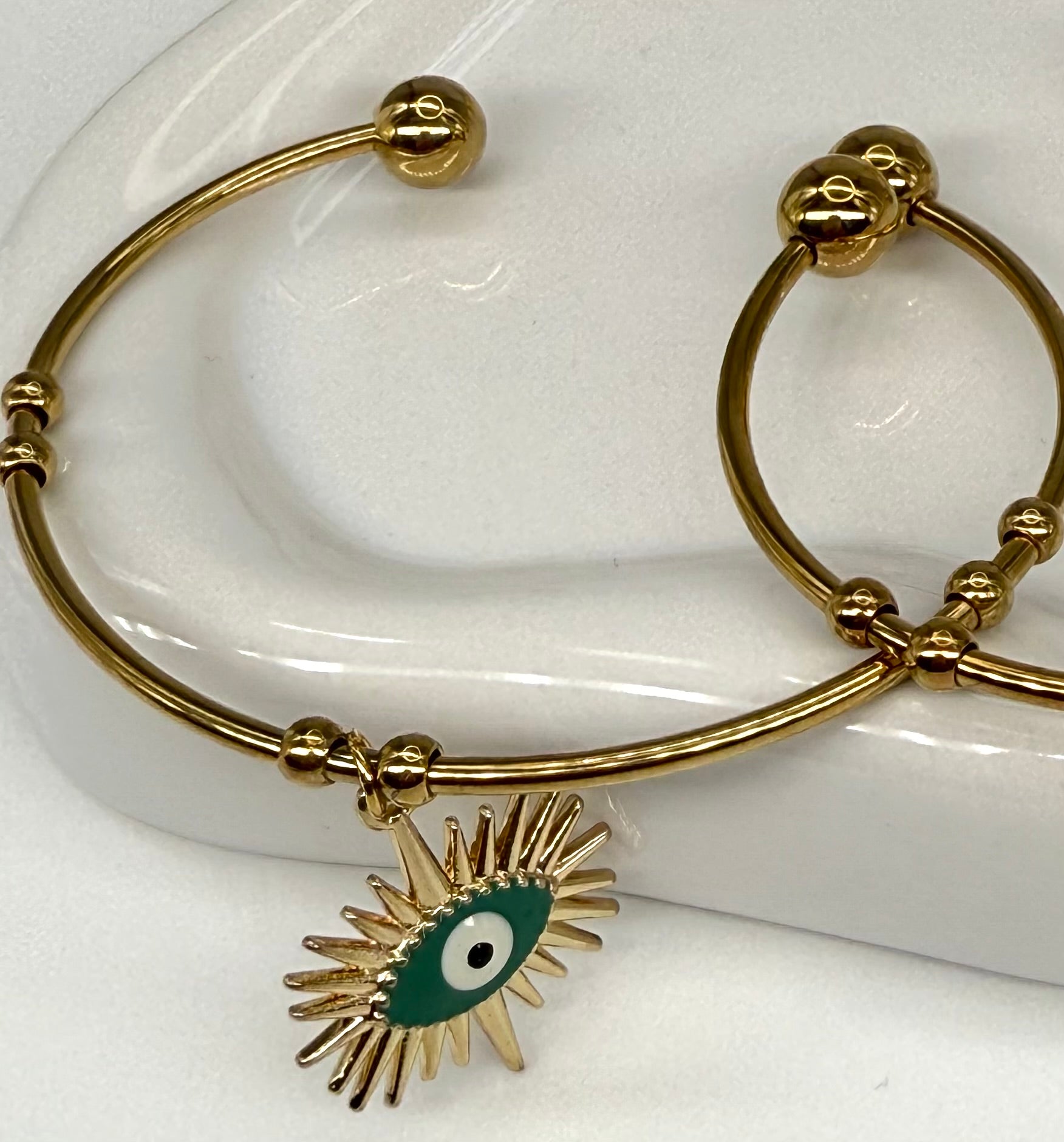 Armreif mit Augensymbol in Gold