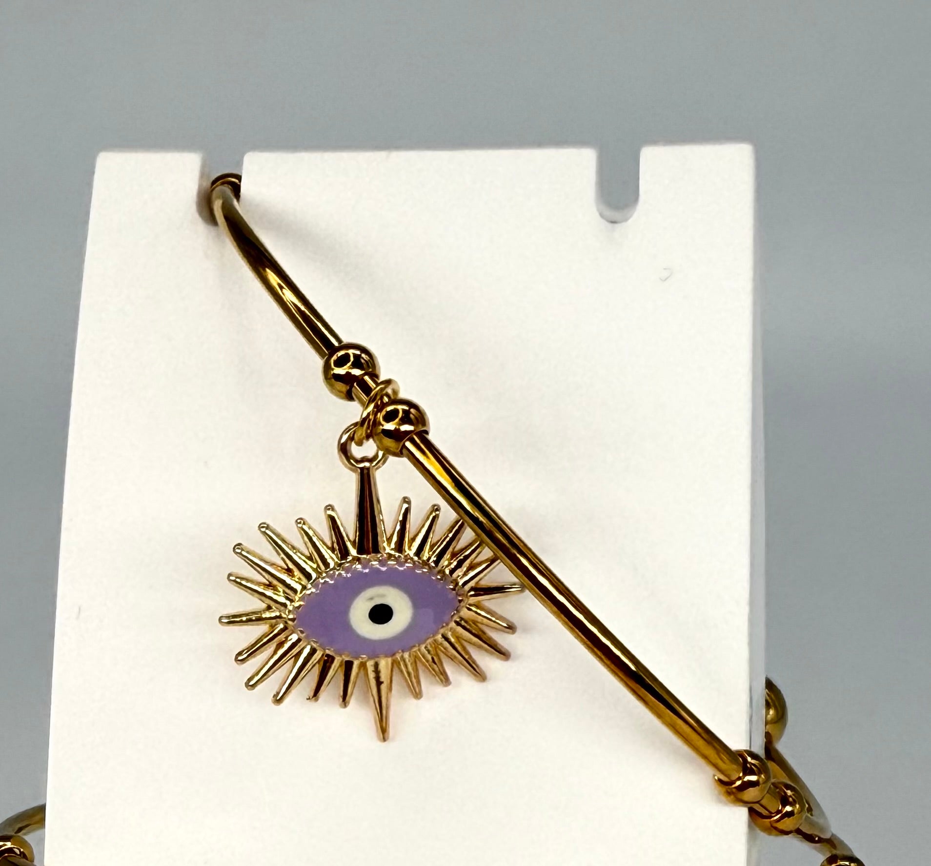 Armreif mit Augensymbol in Gold